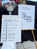 Acrylic welcome sign and order of the day sign styled together