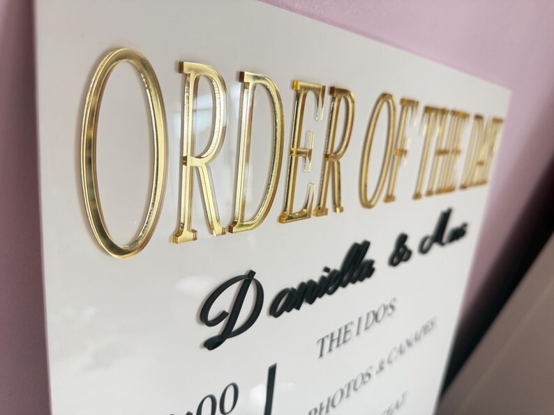 3D gold acrylic lettering close-up